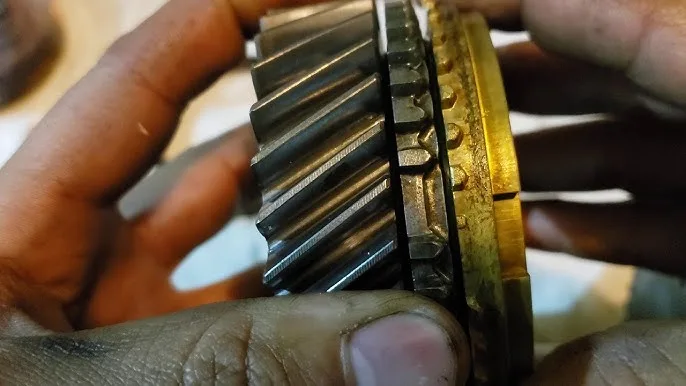 close-up of a brass synchronizer ring from a manual transmission